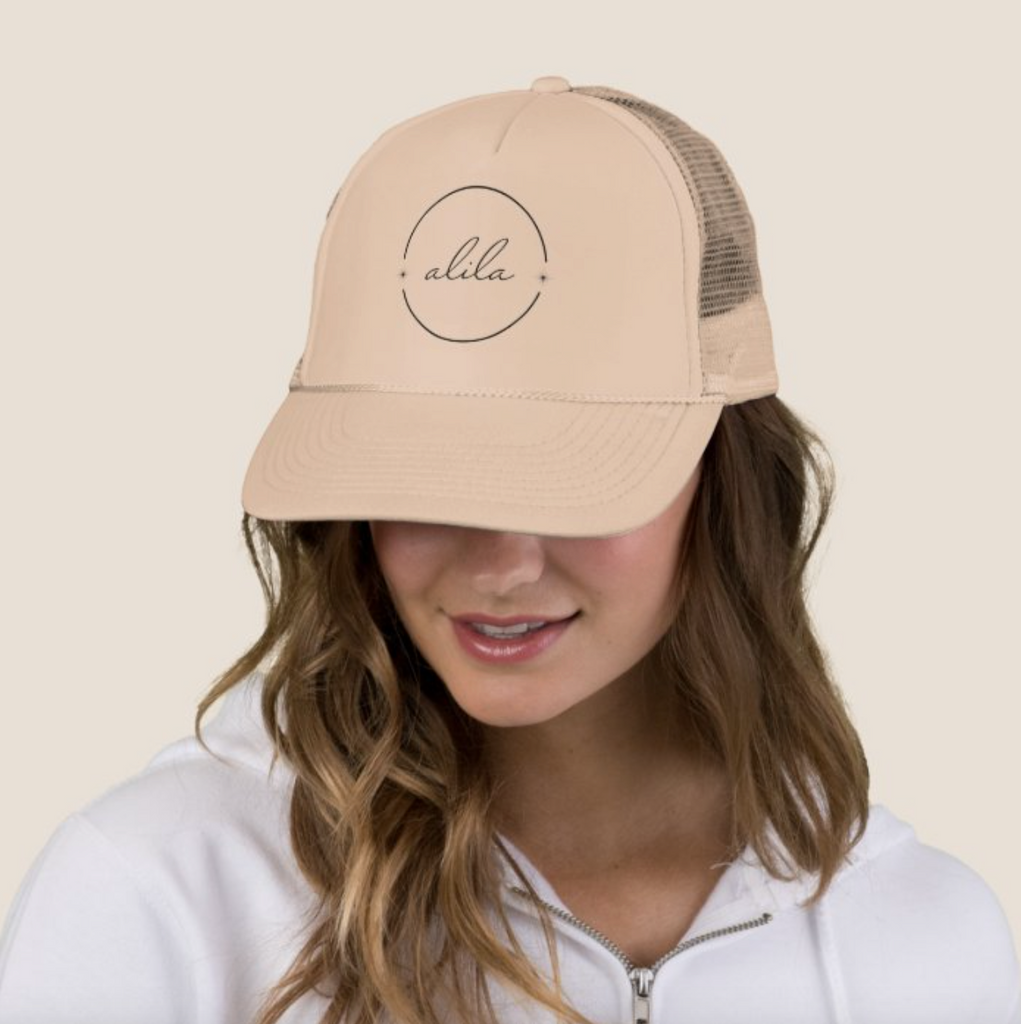 This oversized trucker hat in the perfect neutral tan has a padded front panel, an adjustable mesh back, and excellent Y2K vibes.  For men and women.